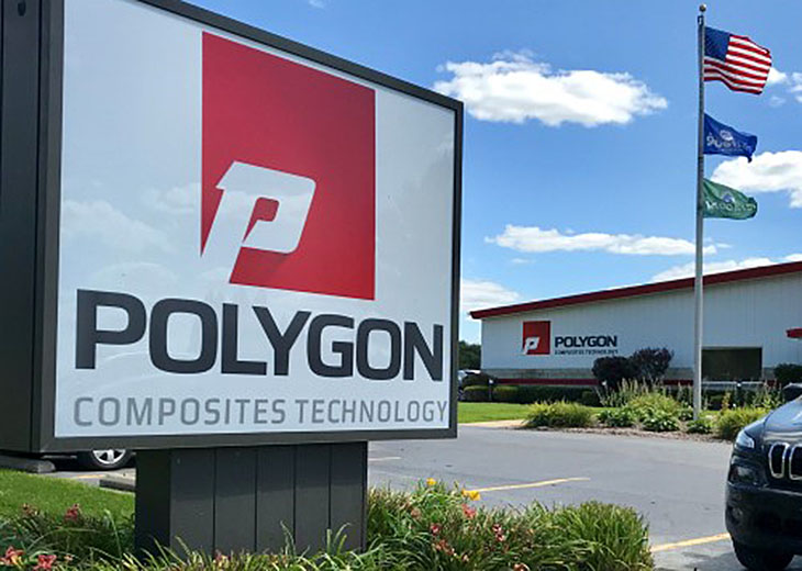 New Logo 2019 - sign and bldg with flag
